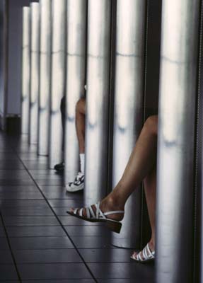 phone booth and legs.jpg (17072 bytes)